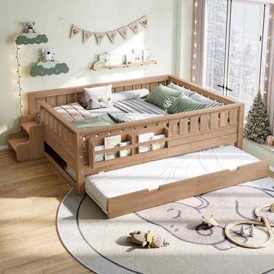 Whimsical Loft Bed with Built-in Bookshelf and Staircase