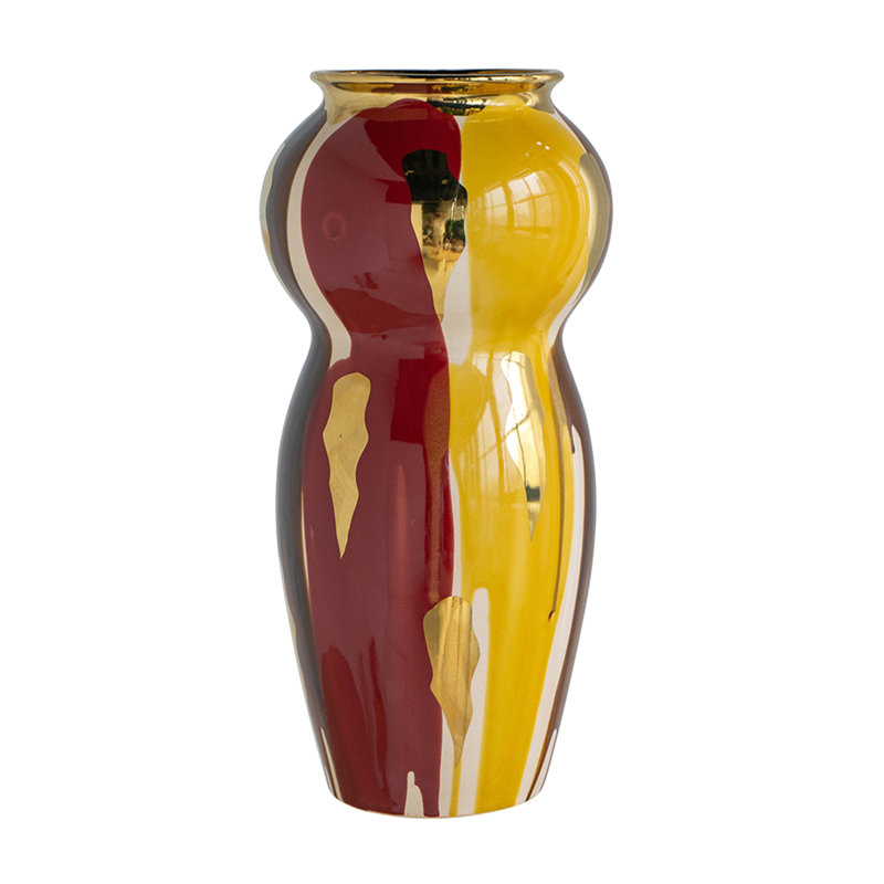 Vase courbé en céramique avec une finition abstraite multicolore