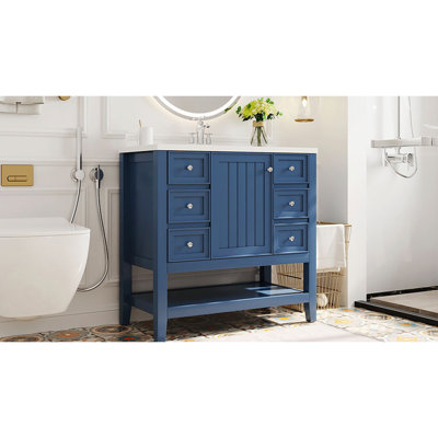 Meuble-lavabo bleu de 36 po avec composition et bois massif, une armoire, trois tiroirs, un lavabo en céramique blanche à finition peinte, un comptoir à rebord plat, un lavabo autoportant, un centre, réglable