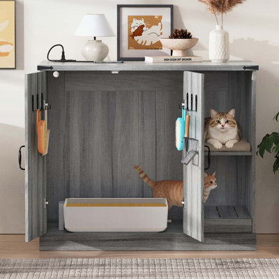 Litière pour chat avec prise de courant