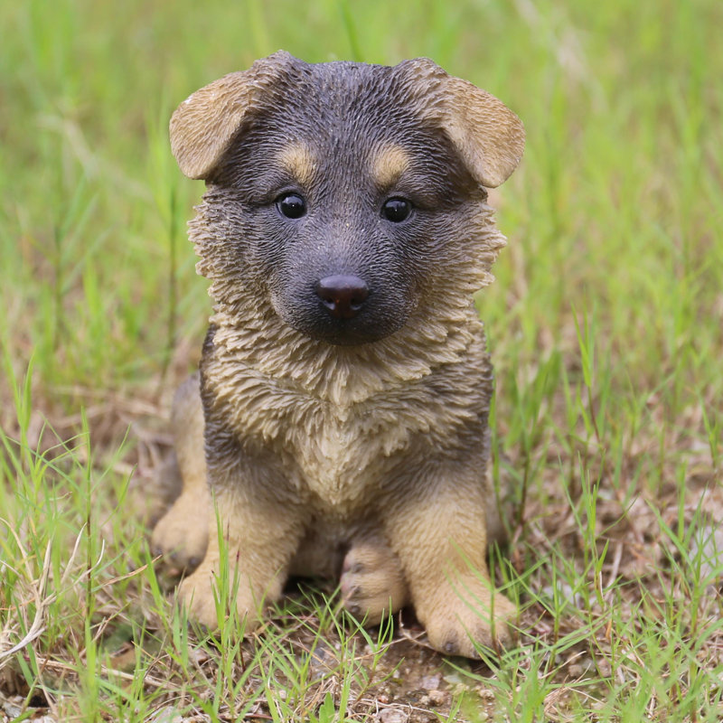 Statue de chiot berger allemand assis