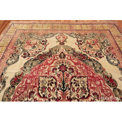 Tapis persan antique rose / ivoire Kerman