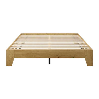 Lit plateforme en bois avec lattes