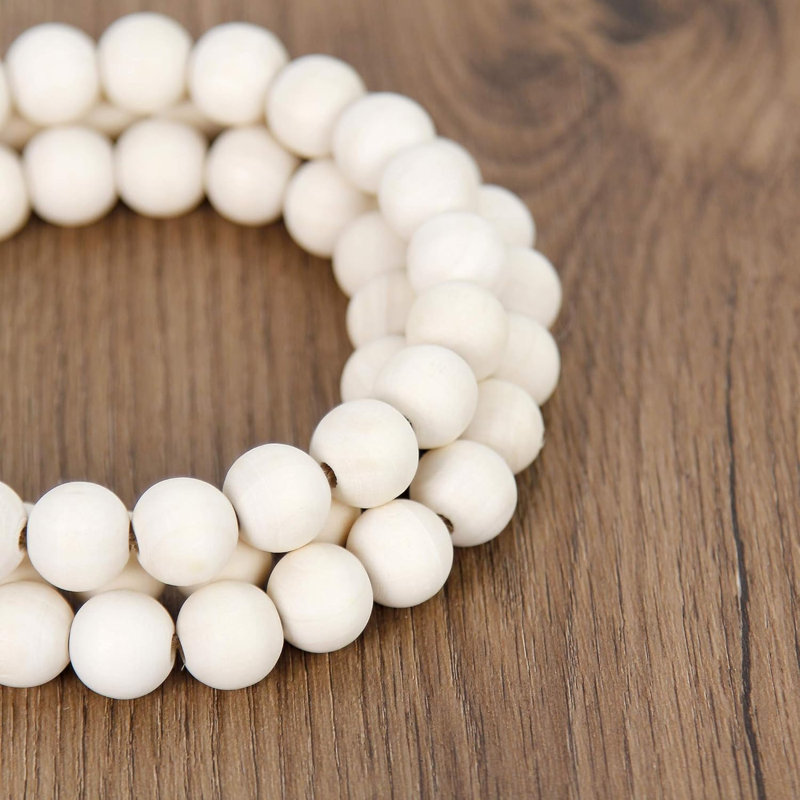 Guirlande de perles de bois 58 "avec pampilles blanches