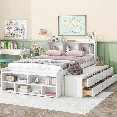 Lit confortable avec bibliothèque latérale intégrée et tiroirs pratiques pour un espace de chambre à coucher propre et relaxant