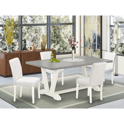 L'ensemble de table de cuisine 5 pièces se compose d'une table rectangulaire en ciment et de 4 chaises en cuir de polyuréthane blanc avec dossier haut - Lin brossé blanc