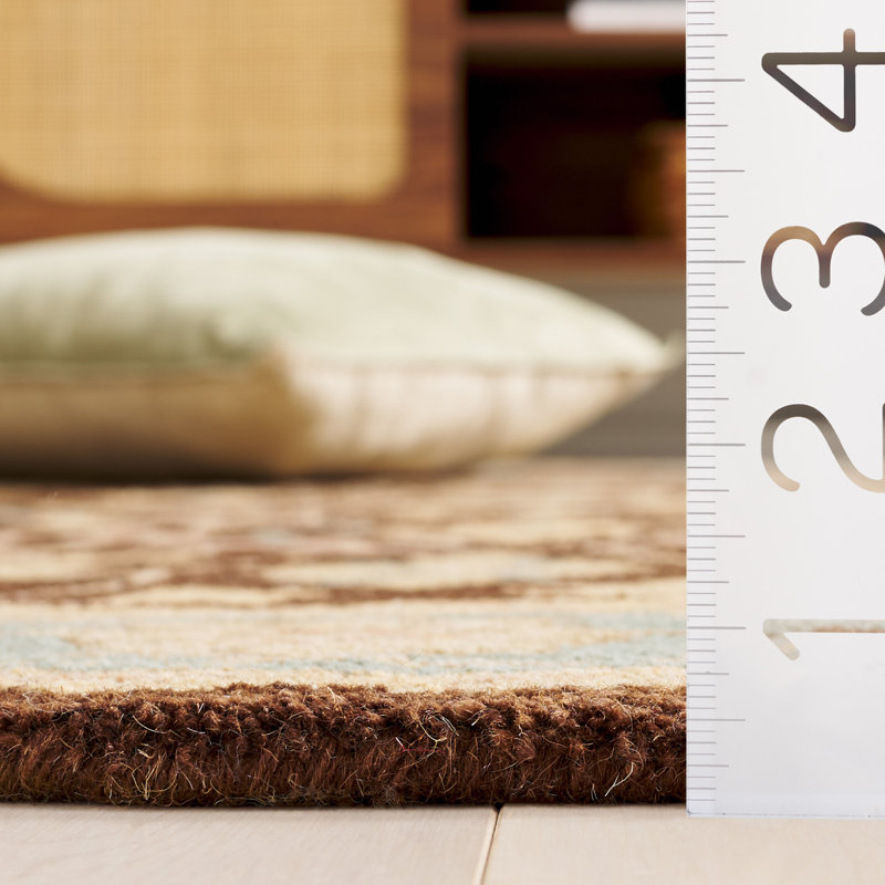 Ivory and Brown Handmade Wool Oval Tufted Rug, 7'6" x 9'6"