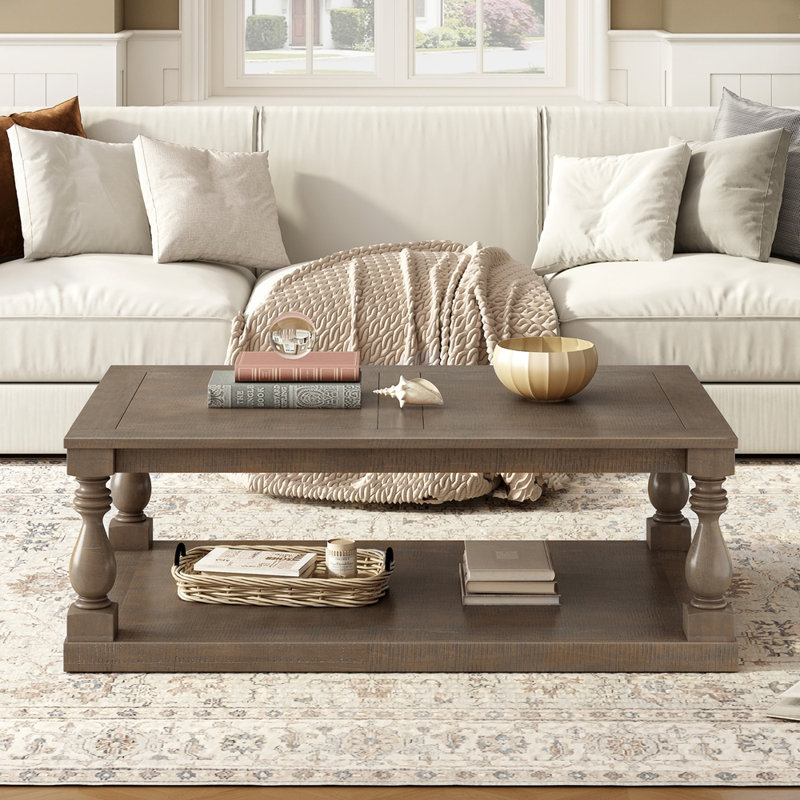 Table basse avec pieds de colonne en forme de vase artistique