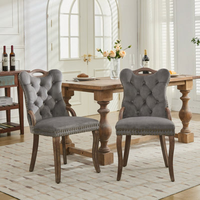 Chaise de salle à manger en velours avec garniture touffetée à la main, poignées en bois massif sur le dessus et les côtés, décoration cloutée en cuivre rétro, pieds en bois massif courbés, ensemble de 2