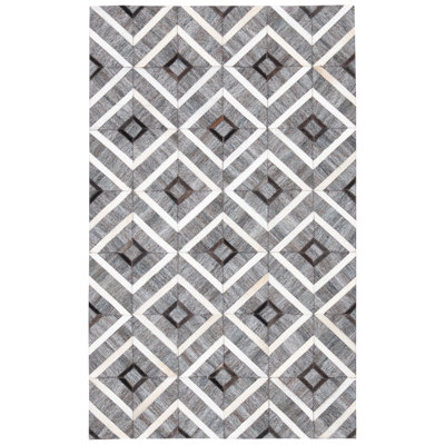 Tapis géométrique en cuir et viscose Sevastopol Studio
