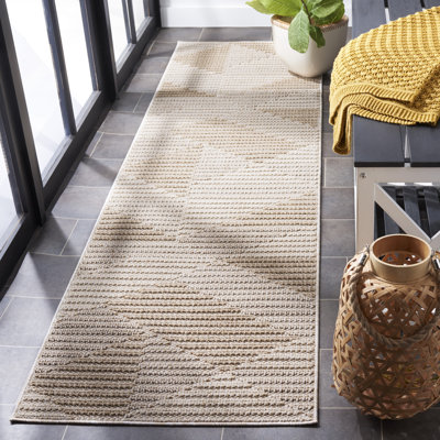 Tapis beige / ivoire en polypropylène tissé à la machine Feffrey