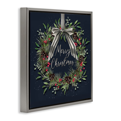 Couronne de Noël suspendue avec cadre flottant à nœuds, design par Elizabeth Tyndall