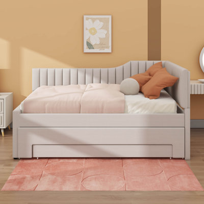 Softly-Padded Daybed Featuring A Roll-Out Trundle And  Roomy Drawers