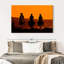 Cowboys au coucher du soleil-107684383