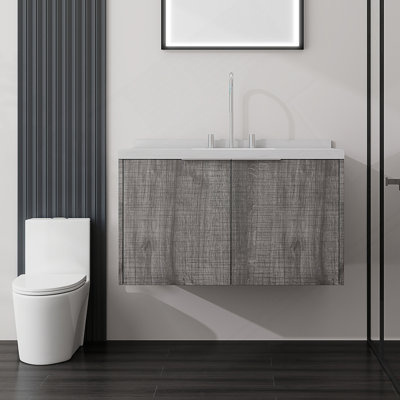 Meuble-lavabo flottant avec comptoir en marbre de culture et portes d'armoire à fermeture en douceur