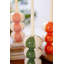  Ensemble de quatre porte-bougies en céramique à motif rayé et décoration de table