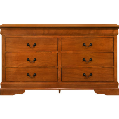 Commode en bois de chêne de style traditionnel - Bases et moulures courbées. Tiroirs à queue d'aronde anglaise.