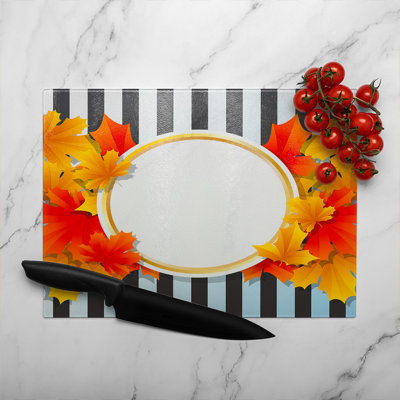 Autumn Leaves On Black Stripes Glass Chopping Board