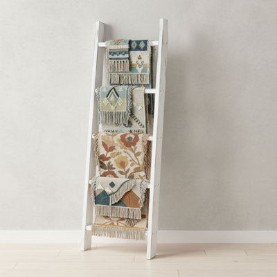 Large, Retro-Style White Wooden Rug Ladder With 5 Rungs And A Wall-Mounted Design, Serving As Both Rug Storage And Towel Hanging Space.