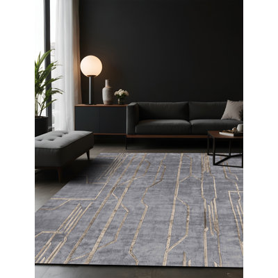 Tapis gris soyeux et moelleux