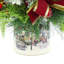 Festive holiday arrangement with greens and Berries
