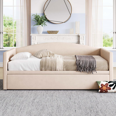 Lit de jour rembourré en velours beige avec lit gigogne escamotable, conception simple pour un très grand lit, parfait pour la chambre d'amis