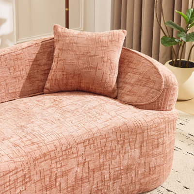 Canapé compressible rose pour deux personnes. Il a des accoudoirs des deux côtés, est livré avec deux coussins, convient aux petits appartements et peut être placé dans le salon ou la chambre à coucher.