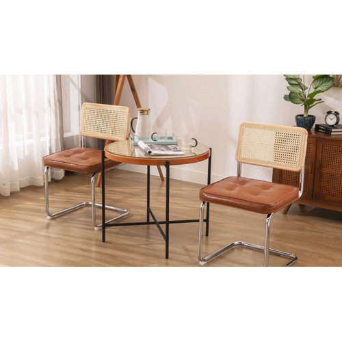 Aveon Tufted Leather Side Chair with Cane Rattan Back