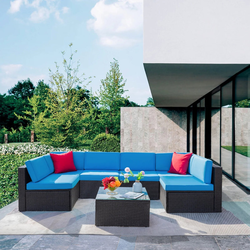 Ensemble de conversation modulaire en rotin 7 pièces avec coussins Bump, Bleu / Rouge