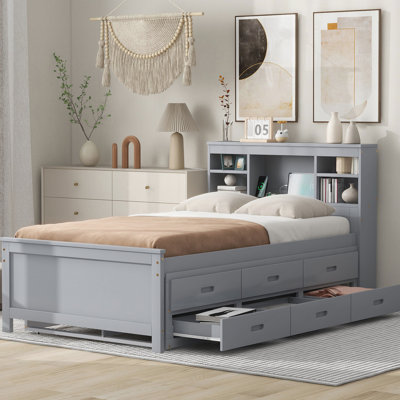 Lit simple gris avec rangement pour tête de lit, 3 tiroirs et plateforme en bois pour un lit gigogne paisible dans un espace fonctionnel solide