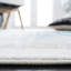 Tapis abstrait ivoire / bleu sarcelle-839578771