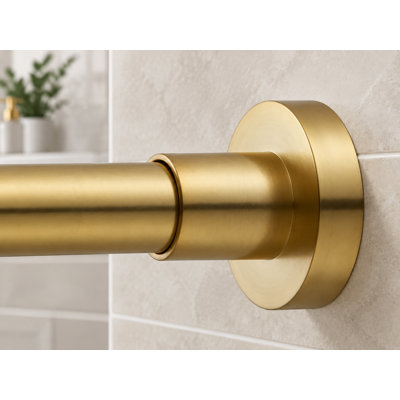 This gold metal steel spring-tension shower rod adjusts from 27-43 inches; the no-drill, non-slip design is intended for windows or bathrooms.