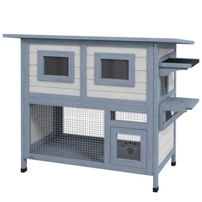 Maison d'extérieur pour chat avec de multiples caractéristiques pour un confort et un divertissement félins