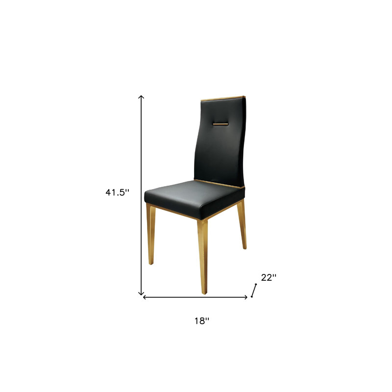 Ensemble de quatre chaises d'appoint de salle à manger rembourrées en similicuir noir et or