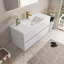 Meuble-lavabo mural 48 po avec lavabo, meuble de rangement flottant pour salle de bain avec comptoir en résine de pierre et tiroirs à fermeture en douceur entièrement assemblés-126271693