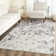 Makeba Floral Ivory/Gray/Purple Area Rug