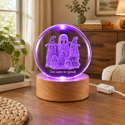 D'un diamètre de 60 mm (2,36 pouces), cette lampe d'appoint en forme de sphère de cristal 3D repose sur un support DEL en bois et utilise un éclairage à changement de couleur dans un style fantôme d'Halloween pour les chambres, les bureaux, les espaces de vie ou comme cadeau décoratif pour elle, lui et les enfants.