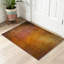 Tapis orange lavable à la machine orange, couleurs dorées abstraites sur fond grunge-1127343976