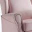 Fauteuil oscillant rose en tissu avec pivot