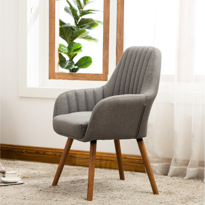 Élégante chaise d'appoint grise avec coussin moelleux et pieds en bois massif avec rembourrage supplémentaire