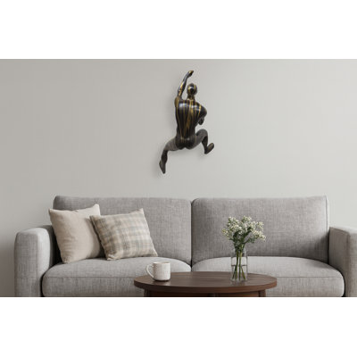 Dramatic Black and Gold Climbing Figure Wall Sculpture - 6in x 11in x 4in