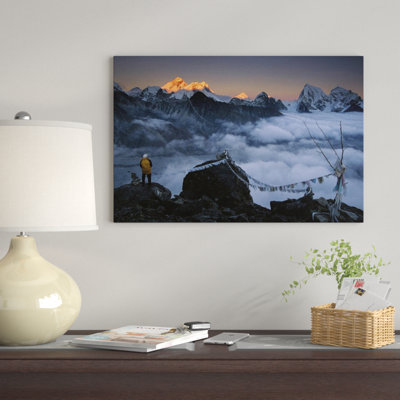 " Mountaineer Enjoying The View Of Mt Everest And The Himalayan Mountains At Sunset From Gokyo Ri, Khumbu, Nepal " by Colin Monteath