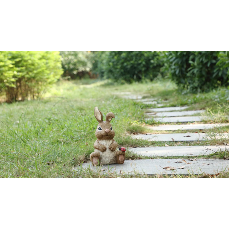 RABBIT SITTING WITH LADYBUG