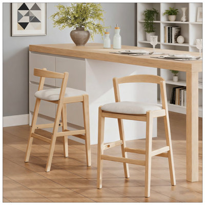 Tabouret de bar d'intérieur en bois d'hévéa Balmans avec finition naturelle et revêtement confortable, parfait pour les cuisines modernes et traditionnelles