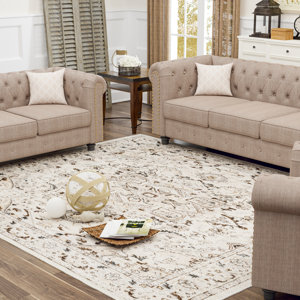 https://assets.wfcdn.com/im/51135263/resize-h300-w300%5Ecompr-r85/2581/258140949/Losh+Performance+Brown%2FBeige%2FCream+Area+Rug.jpg