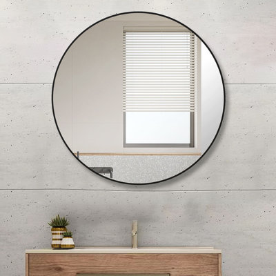Miroir mural rond en métal