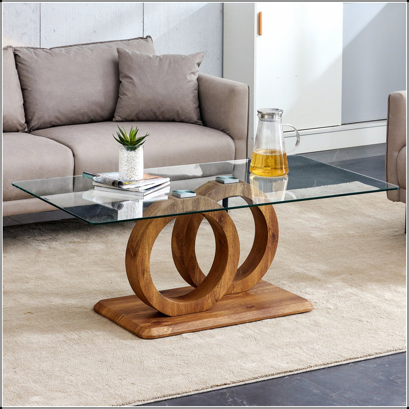 Table basse moderne moderne avec plateau en verre trempé et pieds en grain de bois, parfaite pour les salons élégants