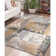 Aracelie  Geometric Patchwork Floral Area Rug in Camel