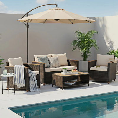Arlington Vintage Woven Wicker/Rattan 4 - Person Seating Group with Solid Wood Table by Sol 72 Outdoor