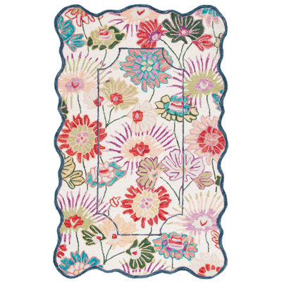 Orri Hand Tufted Wool/Cotton Floral Rug in Green/Ivory